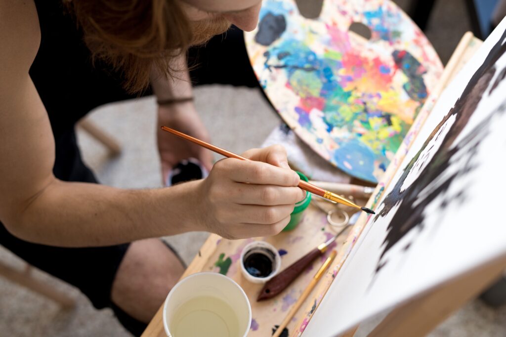 Male Artist Holding Brush